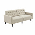 Divano in tessuto beige con gambe in legno